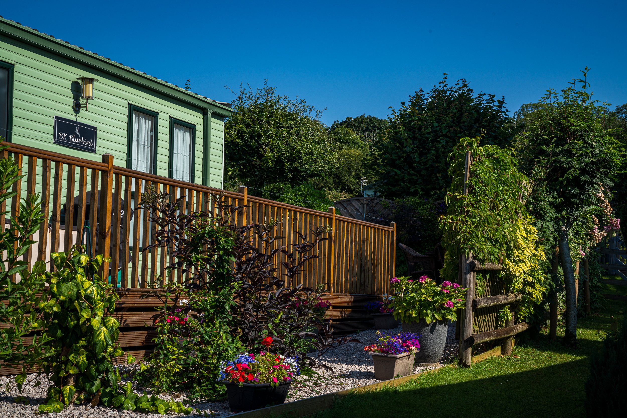 A timber deck and garden at Lingwood Park