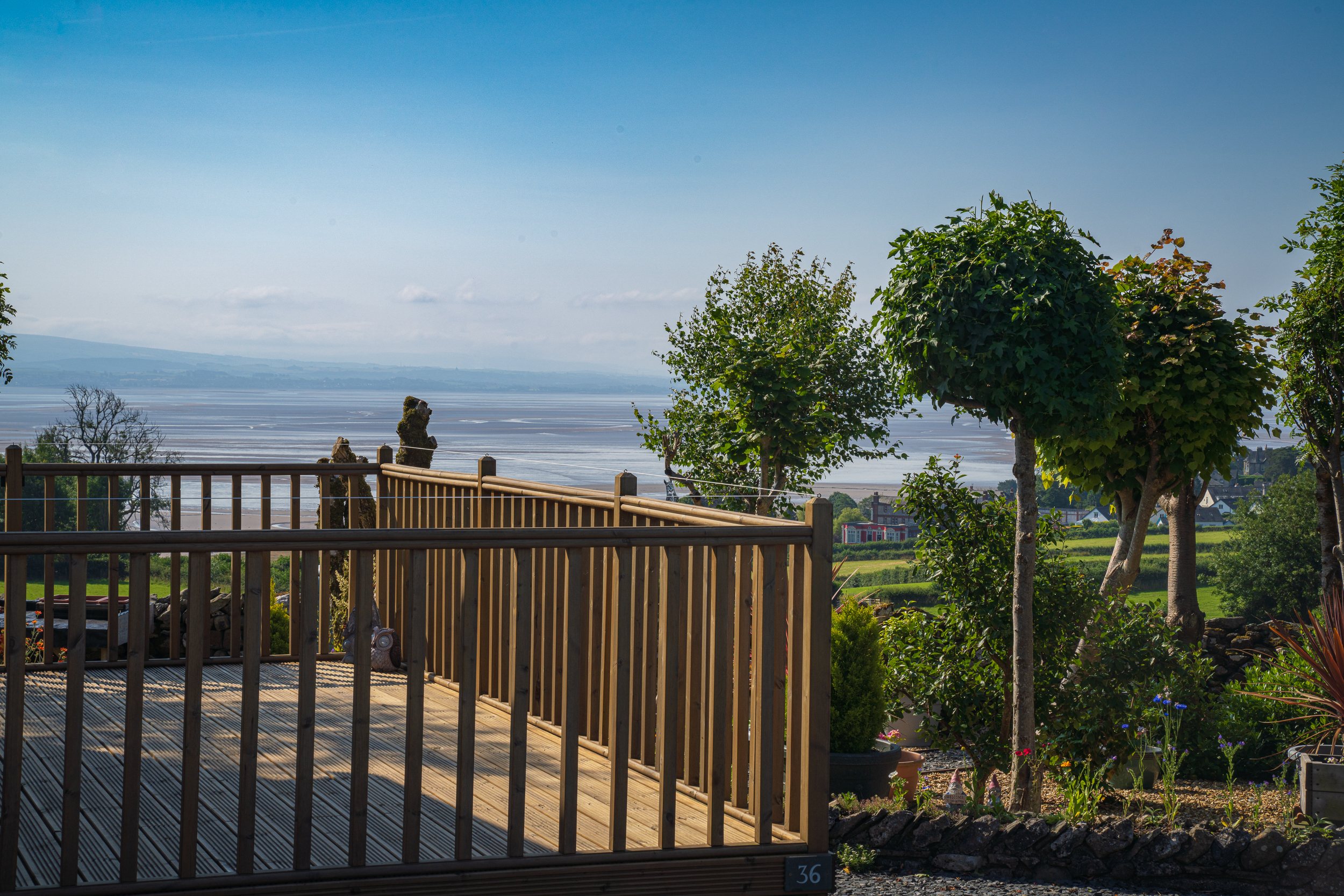 Landscaped holiday home pitches looking towards Morecambe Bay