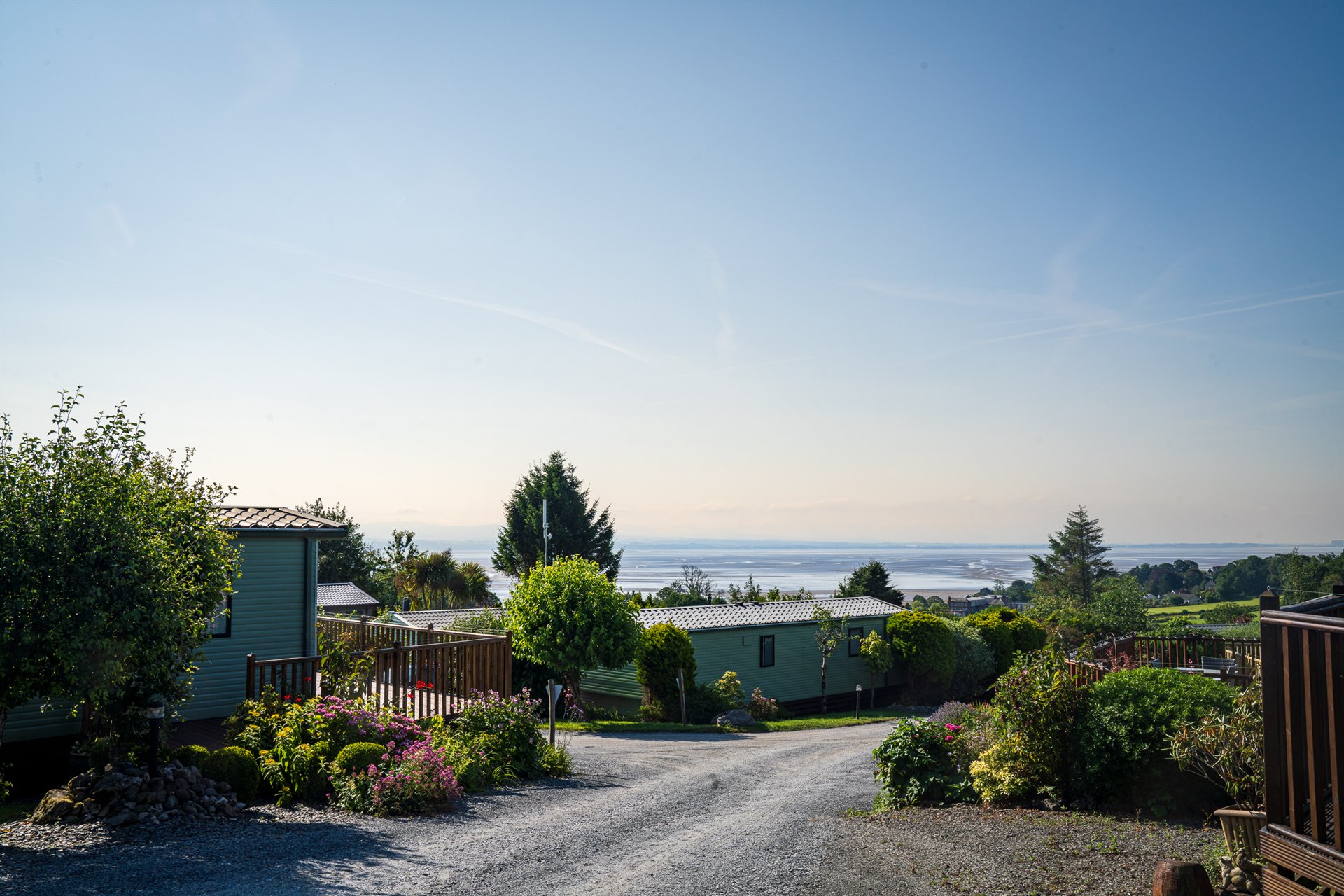 A quiet park road descending towards Morecambe Bay